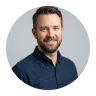 Bearded man in a navy shirt from the Avenix contact team
