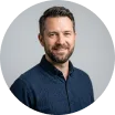 Bearded man in a navy shirt, Avenix agentic AI expert