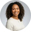 Smiling woman with curly hair, Avenix agentic AI expert